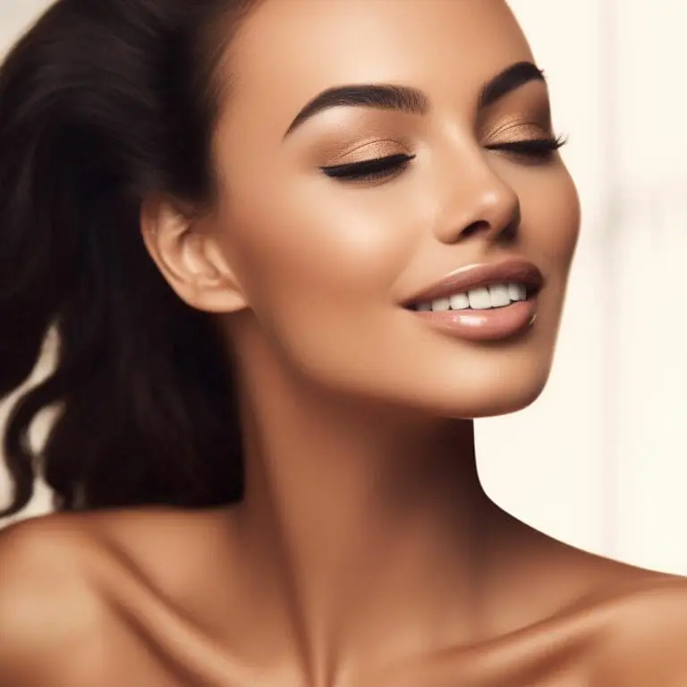 Edgemont Close-up portrait of a woman with a radiant smile, flawless skin after waxing, and stylish makeup, including neutral eyeshadow and defined brows, set against a light background. North Vancouver