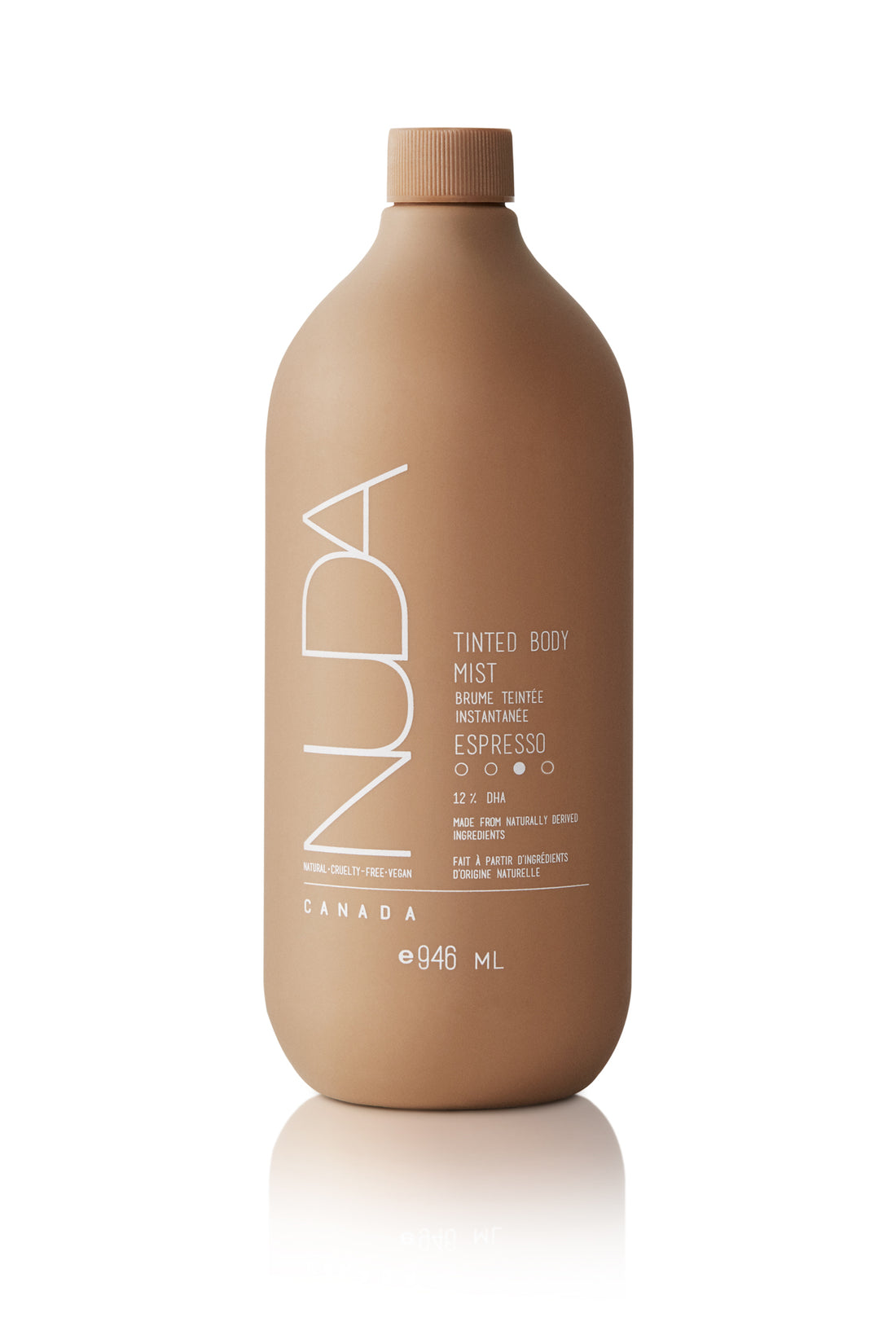 Edgemont A sleek, modern-looking bottle of nuda tinted body mist labeled "espresso" with minimalistic white text, set against a white background. the bottle is tan, reflecting the shade of the product. North Vancouver
