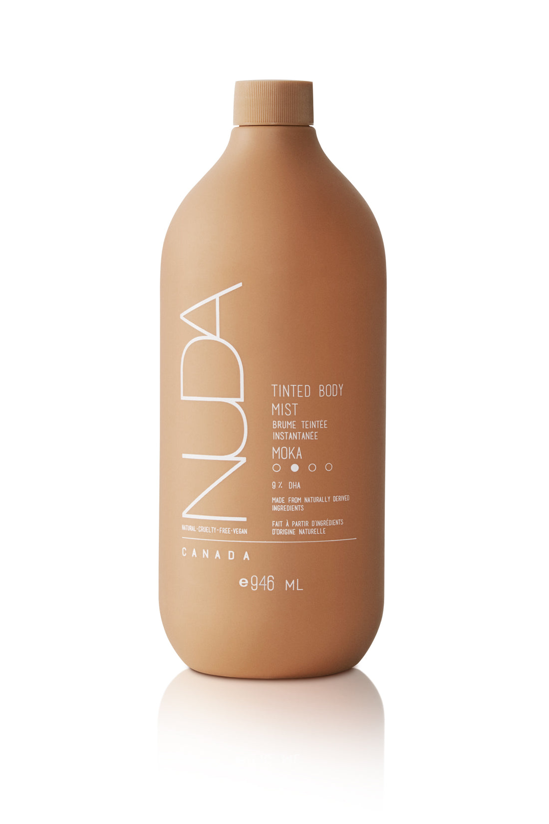 Edgemont A sleek, matte bronze-colored bottle labeled "nuda tinted body mist" with product details and branding on a clean, white background. North Vancouver